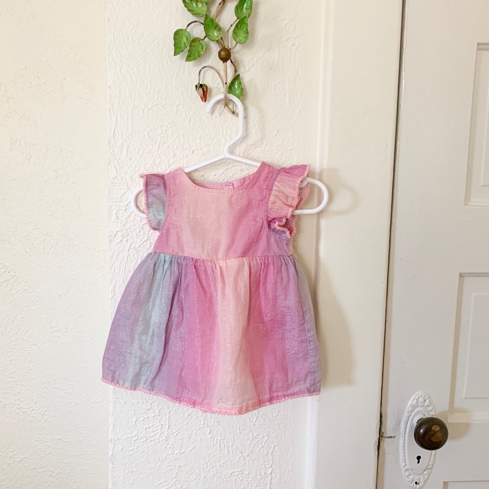 Iridescent pink purple and blue baby girl dress.